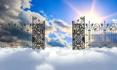 A gate in the clouds with Funeral Programs (4 Pages) behind it.